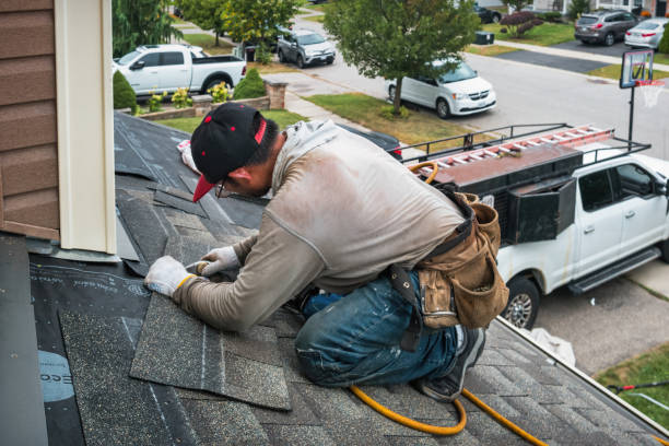 Professional Roofing technician working in Huntington, NY